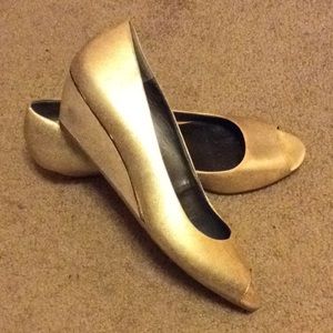 Gold open toe shoes